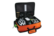 An open CAT5GEAR bicycle BAG with a bright orange exterior, black interior lining, and various CYCLING items organized inside, including a white bicycle helmet, a green bottle, shoes, gloves, shown on a white background.