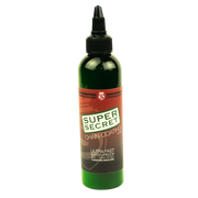 Bottle of Super Secret chain coating on a white background, 4oz
