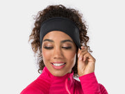 Bontrager Thermal cycling headband worn over the ears, front view with Bontrager logo at upper left