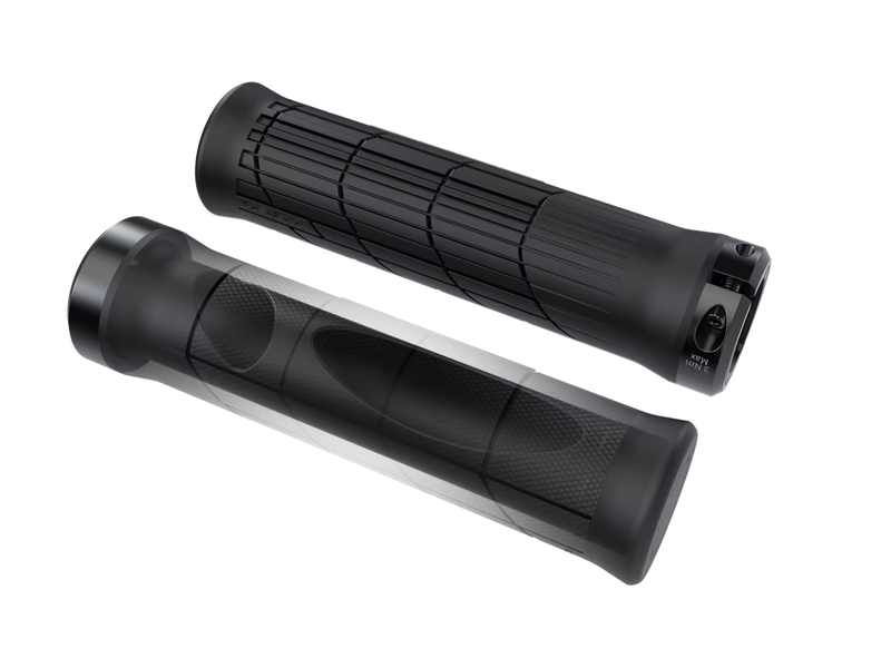 Two black bicycle grips on a white background, positioned diagonally to show the finger indentations and textured grip pattern on both sides.
