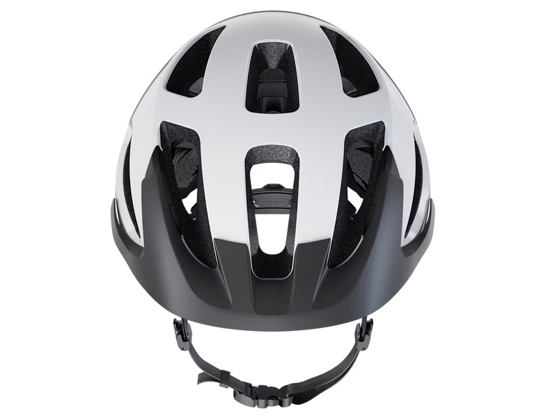 Front view close-up of the Trek Solstice Bike Helmet in Crystal White Gloss, highlighting the large front vents, interior foam liner, and matte black visor.