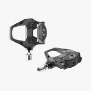 Pair of black bicycle pedals on a white background
