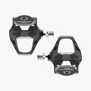 Two black Shimano Ultegra bicycle pedals on a white background