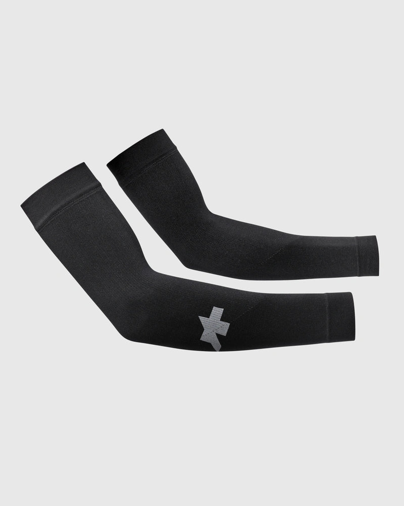 Black arm sleeves with a logo on a light gray background