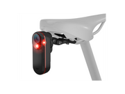 Bicycle light and camera attachment on a white background