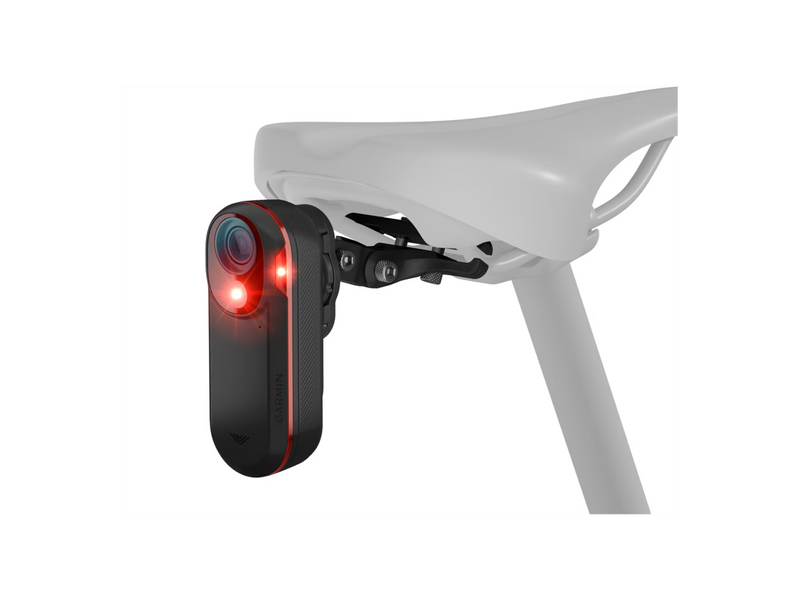 Bicycle light and camera attachment on a white background
