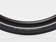 Close-up of a black bicycle tire with 'H2 Hard-Case Ultimate' branding on a white background