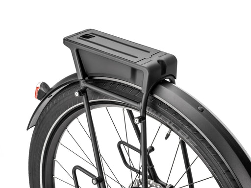 MIK rear rack platform mounted above the rear wheel of a bike, shown on a white background.