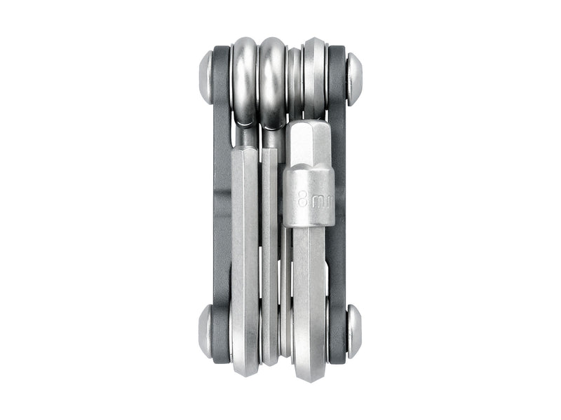 Multitool with multiple tools folded together on a white background