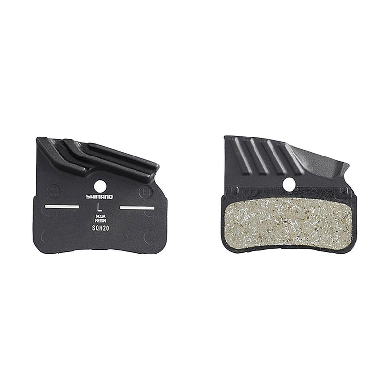 Pair of brake pads on a white background