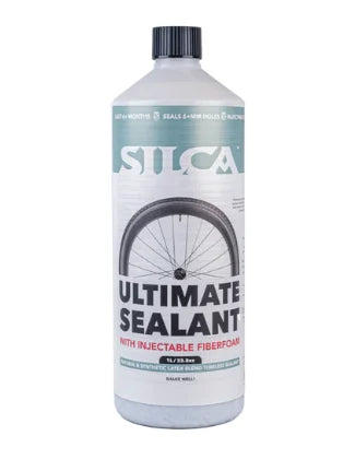 Silca Ultimate Sealant bottle with a bicycle tire graphic on a white background