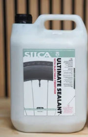 Silica Ultimate Sealant container on a wooden surface