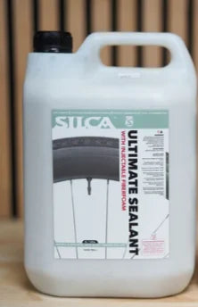 Silica Ultimate Sealant container on a wooden surface