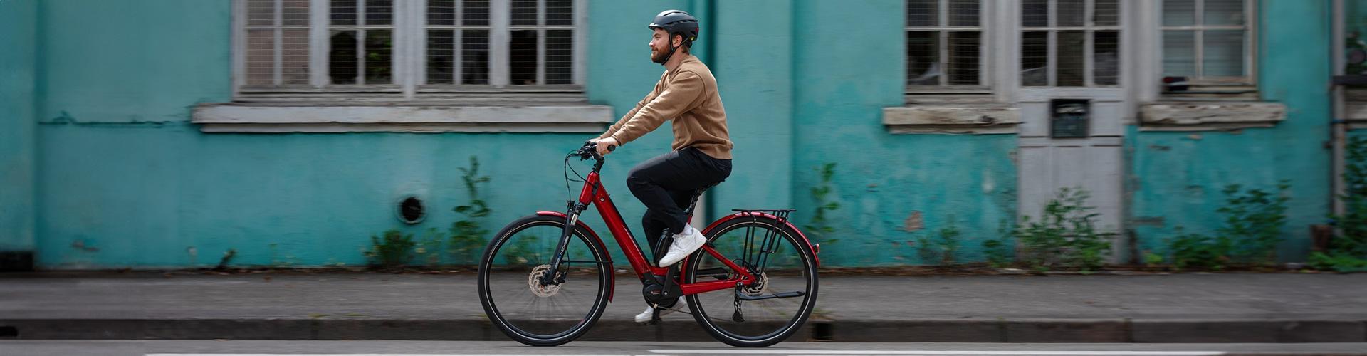 man riding ebike
